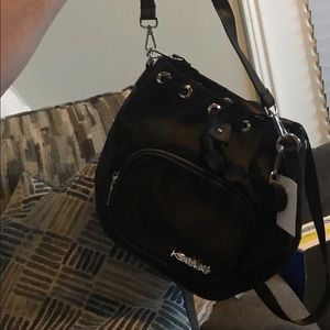 Sling bag never used this still has tag price is negotiable please pm me